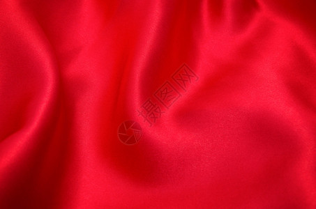 作为背景的红色缎子或丝绸织物图片
