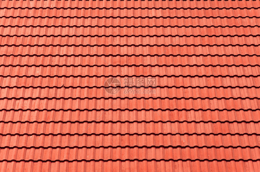 背景的红瓦屋顶图片