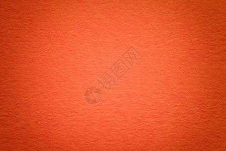 复古深红色纸背景与小插图的纹理带框架的密集橙色牛皮纸板结构感觉背景图片