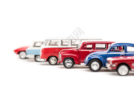 白色的多彩玩具汽车和公共汽图片