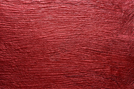 红色天鹅绒彩色纸纹理背景的照片背景图片
