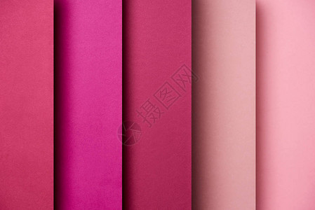 粉红色和洋红色调的重叠纸张图案图片