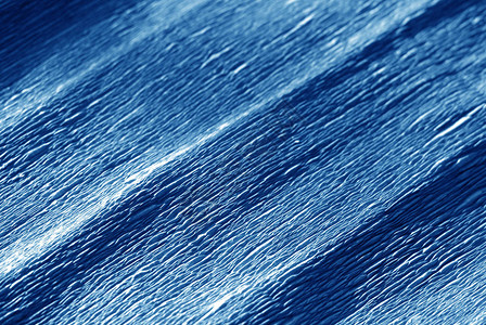 Crepe纸以海军蓝色的模糊效果摘图片