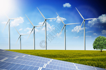 光伏太阳能电池板和风力涡轮机背景图片