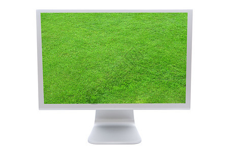带有白色背景绿色青草图像的计算机监视器以白图片