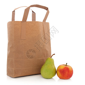 回收的棕色纸包装袋苹果和梨子背景图片