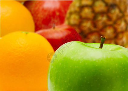 新鲜的苹果和柑橘类水果特写图片