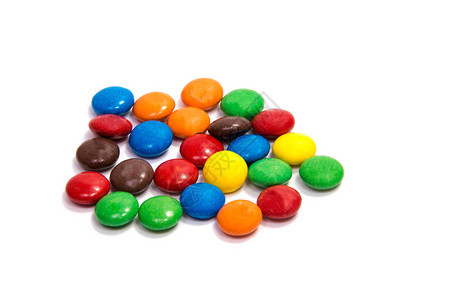 在表格背景上的糖果颜色彩图片