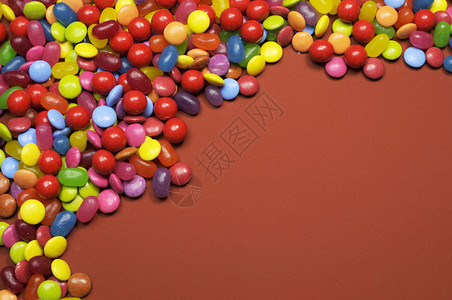 多色糖果棒糖和果的明亮多彩背景摘要图片