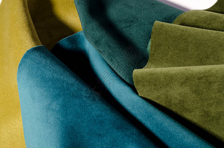 以绿色颜光亮地抽象收集绿色的黄宝石丝绒纺织品样本FabricT图片