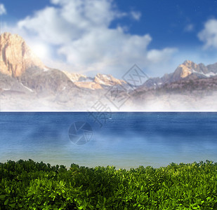 蓝色天空绿色植被和壮观山峰的热带天堂图片