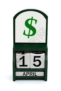 日期为4月15日的木日历和美元图片