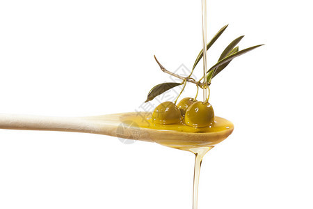 橄榄油喷气机用木勺背景图片