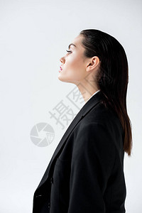 穿着黑色夹克的有吸引力的魅力女孩的简介肖像背景图片