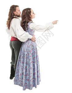 穿着中世纪服装的一对漂亮的夫妻男女被隔图片