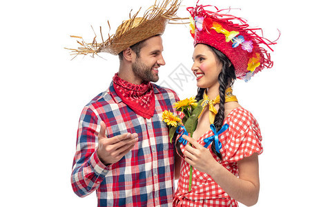 穿着服装的快乐男人和年轻女人与向日葵图片