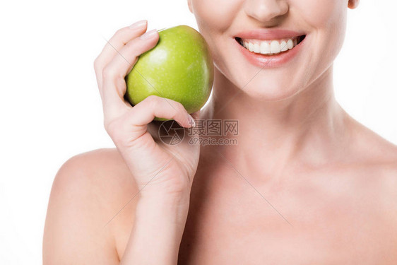 以纯净的皮肤将苹果放在白色孤图片