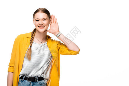 微笑着的有笑容的女孩用手亲近耳图片