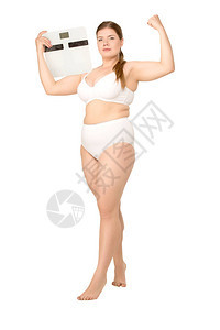 有吸引力的超重女人穿着白色内衣摆着鳞片图片