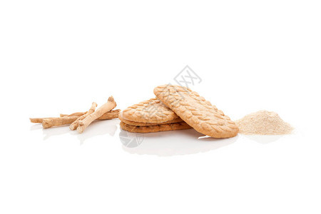 营养补充剂ashwagandha根粉和饼干隔图片