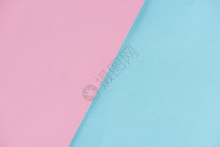 背景粉色和蓝纸层近拍背景图片