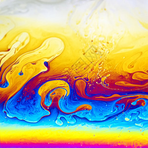 由肥皂泡沫或背景油制造的抽象颜色图片