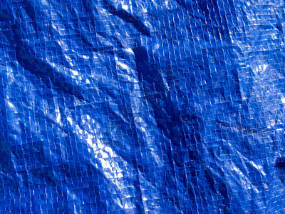 蓝色编织塑料篷布背景纹理图案图片