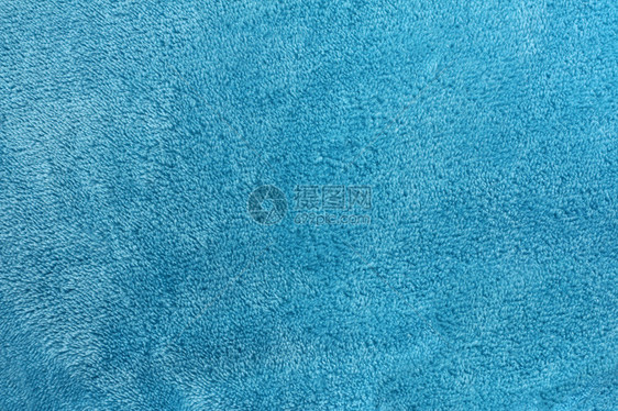 蓝绿色背景舒适的微绒毛毯图片