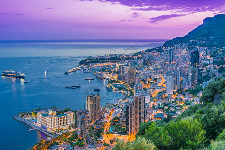 摩纳哥市在日落后法国里背景图片