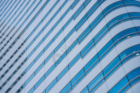 现代办公大楼以蓝色玻璃图片