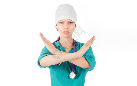 冷静的专业女诊所医生双手掌交叉做拒绝手势图片