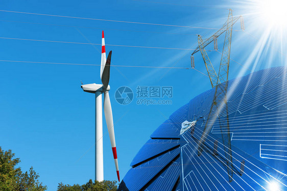 太阳面板和风力涡轮机在清蓝的天空上图片