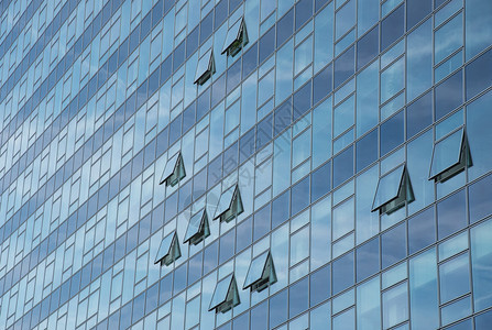 现代蓝色玻璃摩天大楼的建筑结构图图片