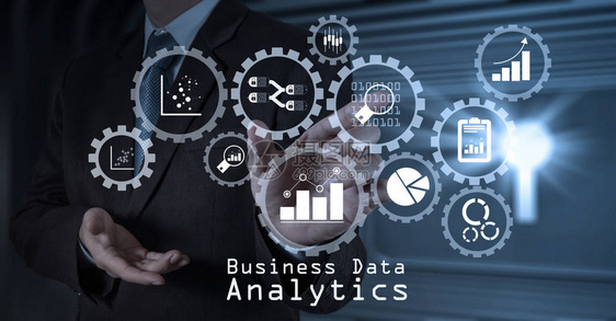 业务数据分析管理与连接齿轮与KPI财务图表和图形商人手与触图片