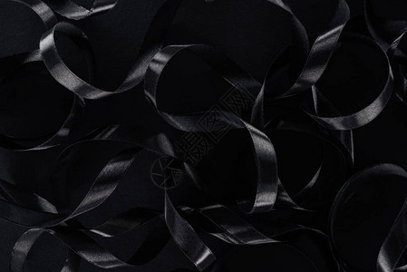 黑光丝带作为黑色星期五背背景图片