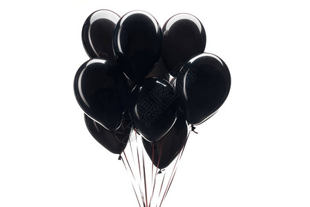 黑气球在白色上被隔离用于黑背景图片