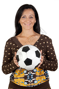有魅力的女孩带着足球孤立图片
