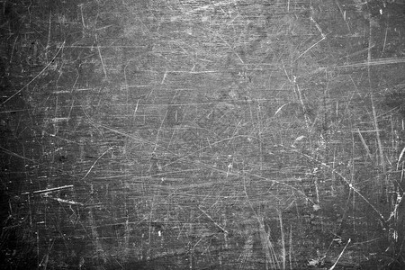 grunge灰色纹理划痕墙的背景图片