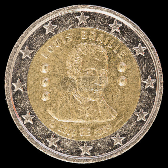 2009年比利时发行的纪念盲文字母发明者路易斯布莱叶200周年纪念币在黑色背景图片