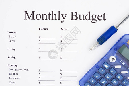 创建月度预算用笔和计算器打印月图片