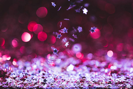 圣诞质地粉红色和银色闪亮的五彩纸屑星落图片