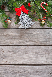 圣诞装饰松树人物和花环框架概念背景图片