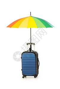 带箱子和雨伞的旅行概念在白色图片