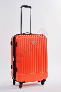 个人行李袋白色背景现代红色手提箱和手图片