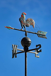 以显示风向方用一只公鸡用铁制成的龙头和红衣主教点西图片