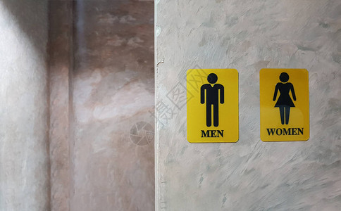 男女公共厕所女士和先生洗手间的标志叫wc百货公司复古风格装饰混凝土墙后的混合别符号厕所和图片