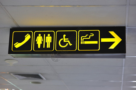 机场厕所标志黑底黄图片