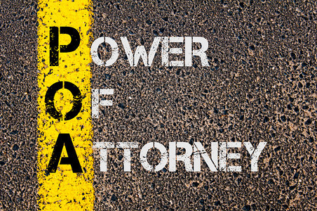 在标有黄漆线的公路上写成的作为检察官权力的POA商业背景图片