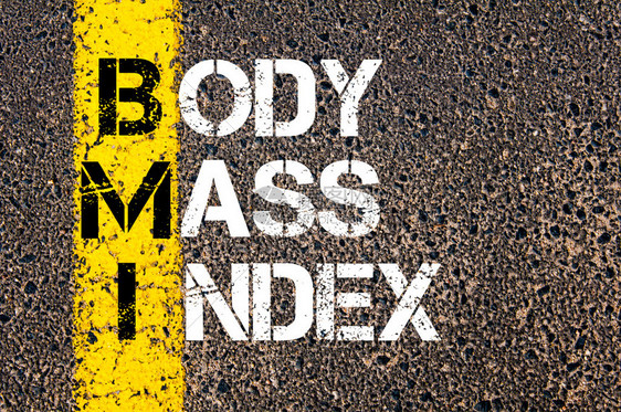 AcronymBMI身体质量指数在沥青石底部的道路上使用黄漆图片
