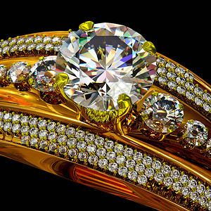与钻石宝订婚的金戒指豪华珠宝和晶石宝双焦糖黑色背背景图片
